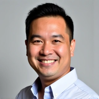 Professional headshot of Bapak Budi Santoso, a male nutritionist with a friendly expression, wearing smart casual attire.